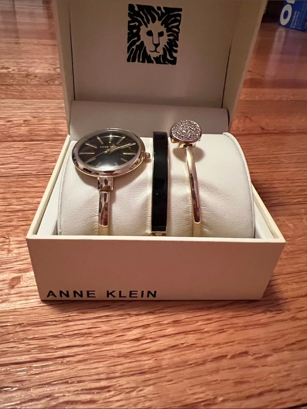 Anne Klein Gold and Black Watch with Two Coordinating Bangles
